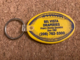 1988 Huskies Schedule Bel Vista Draperies Vintage Keychain Fob Football - $9.41