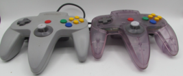 Lot of 2 Nintendo N64 OEM Controllers Gray &amp; Purple Tested tight sticks ... - €26,15 EUR