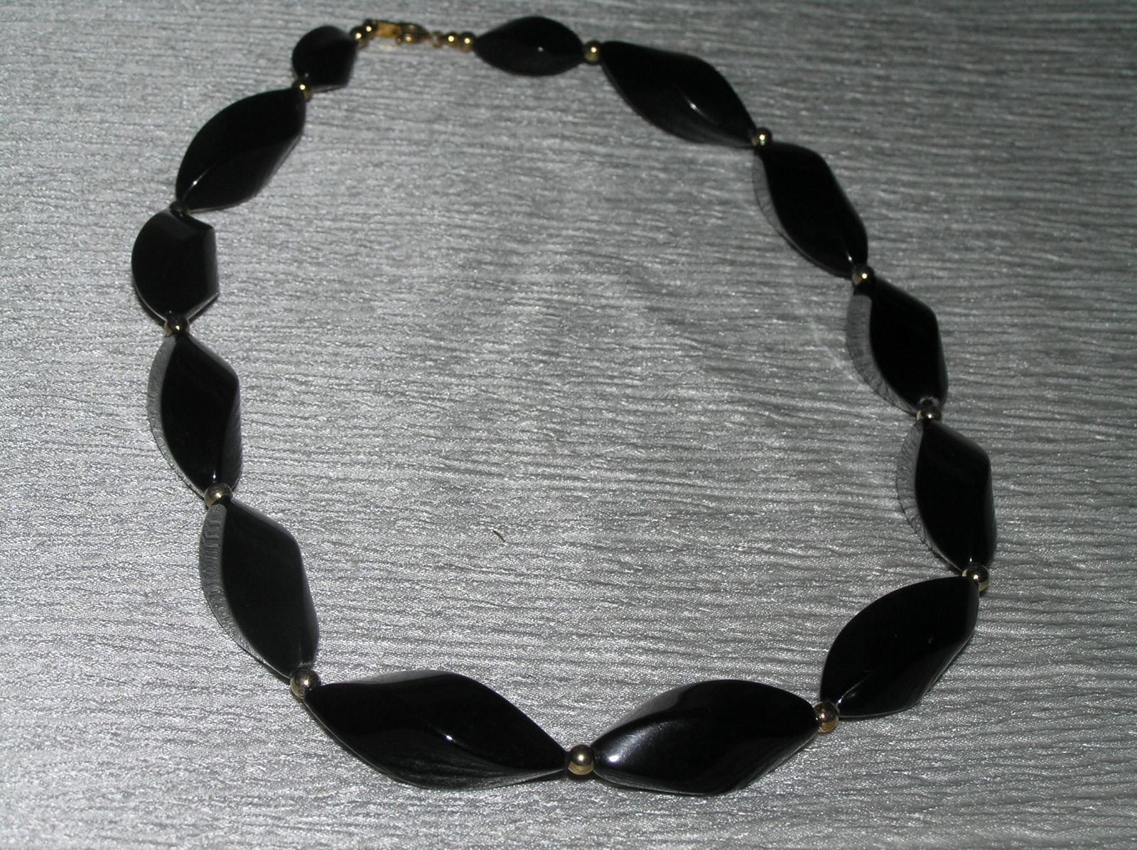 Estate Trifari Marked Black Plastic Twist with Goldtone Spacer Bead Necklace – - $8.59