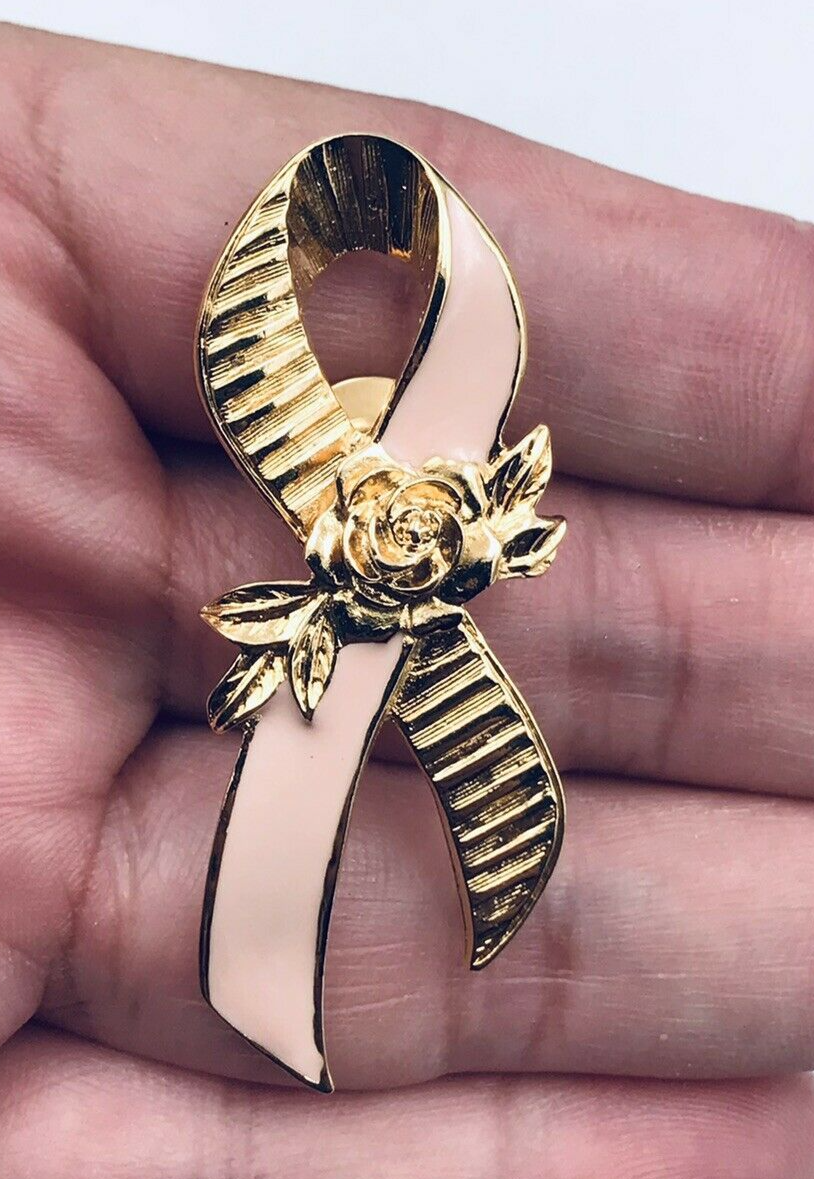 Primary image for Vintage Avon Gold Tone Pink Ribbon Breast Cancer Awareness Brooch Pin 2" x .75"