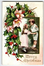 Christmas Postcard Victorian Children On Swing Embossed Holly Leaves Vintage - £10.09 GBP