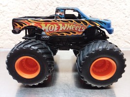 Hot wheels Monster JAM Team Hot WHEELS 1:64 scale Plastic base Orange rims - $12.86
