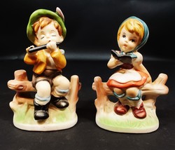 Set of 2 Boy/Girl Sitting on Fence Playing Flute Reading Book Porcelain Figurine - £23.54 GBP