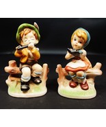 Set of 2 Boy/Girl Sitting on Fence Playing Flute Reading Book Porcelain ... - $29.69