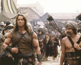 Arnold Schwarzenegger in Conan the Barbarian in medievil village 16x20 Poster - £15.92 GBP