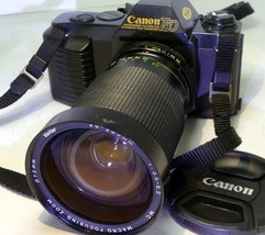 Canon T50 35mm SLR Film Camera with FREE Vivitar 28-205mm FD lens - camera works - $70.36