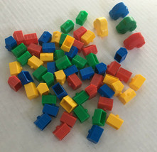 Monolopy junior game piece lot plastic houses cars red yellow blue green... - $19.75