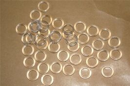 13mm clear sew on roman blind cord rings. Various packs available - $52.93 MXN+