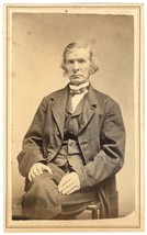 CIRCA 1860&#39;S CDV Stern Looking Older Man Sitting Down Wearing Suit and Bow Tie - £7.41 GBP