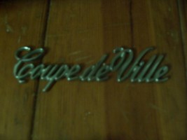 1991 1993 COUPE DEVILLE SIDE TRIM EMBLEM ORNAMENT OEM USED ORIG CADILLAC... - $49.65