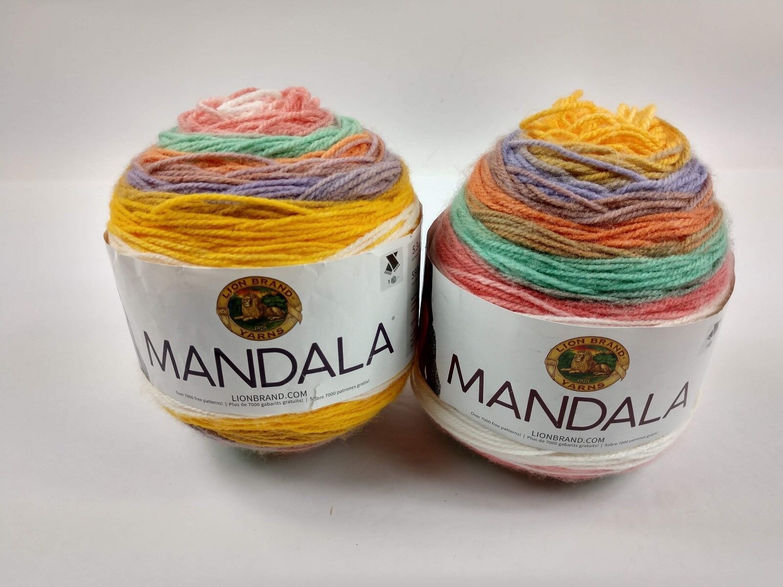 Lion Brand 525-205 Mandala Yarn Pixie Set of 2 skeins oranges yellows purple gre - £13.14 GBP