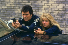James Darren and Heather Locklear in T.J. Hooker pointing guns by police car 24x - $23.99