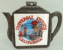 Vintage Sony Universal Studios Teapot Cast Iron Trivet - £22.70 GBP