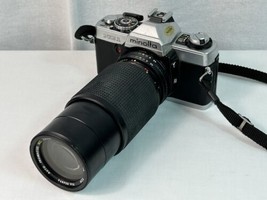 Minolta XG-1 35mm Slr Film Camera w/ Carrying Case + 205MM &amp; 50MM -FRESH Battery - £98.92 GBP