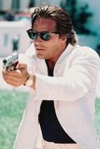 Don Johnson Miami Vice cool in pose in white jacket pointing gun 18x24 Poster - £17.92 GBP