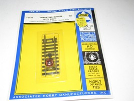 HO TRAINS VINTAGE AHM #2526 BRASS BUMPER W/LIGHT - CARDED- NEW- S32 - $12.30