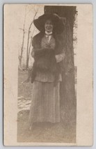 RPPC Pretty Woman with Large Hat and Hand Muff Photo at Tree Postcard H30 - £12.54 GBP