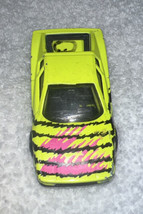 Matchbox 1986 Ferrari Testarossa Neon Yellow Black And Pink 1:59  - $2.99