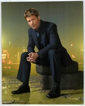 V Joel Gretsch Press Photo Actor Seated on Tires in Urban Night Scene - $4.85