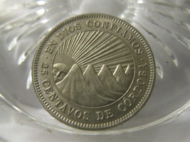 (FC-510) 1964 Nicaragua: 25 Centavos { partial raised double rim } - £4.71 GBP