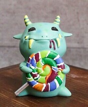 Ebros Gift Green Mogu Monster With Lollipop Sweet Tooth Hypnotic Alien Figurine - £14.38 GBP