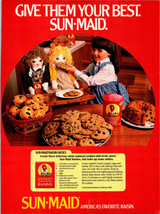 Vintage 1985 Sun-Maid Raisins Girl Feeding Cookie to Dolls Print AD - $5.22