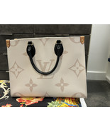 Louis Vuitton Onthego MM Tote Bag Monogram Dune canvas on the go - $87,412.56 MXN