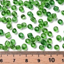 Z  1 pound seed bead glass Transparent GREEN 4mm  X12 - $12.34