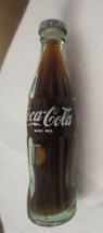 Coca-Cola MARC REG  3 INCHES MINIATURE CONTOUR GLASS BOTTLE WITH LIQUID - $9.41