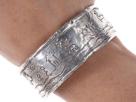 Strange, Heavy, Super cool sterling silver cuff bracelet - $287.10