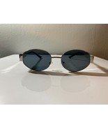 Unisex, silver framed sunglasses with oval shaped smoke gray lenses - $10.00