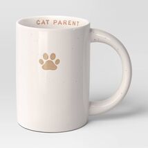 Room Essentials Stoneware Embossed Paw Cat Parent Mug Ivory 14oz - $229.23 MXN Room Essentials Stoneware Embossed Paw Cat Parent Mug Ivory 14oz - $229.23 MXN