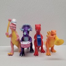 Ankyo Marching Band Dinosaurs Lot of 4 Plastic Dinosaurs w/ Instruments Toys - £23.97 GBP