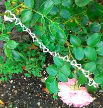 SILVER HEART BRACELET(JUMBLED HEARTS) - $105.00