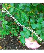 SILVER HEART BRACELET(JUMBLED HEARTS) - $105.00