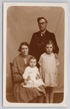 RPPC Vintage Family Portrait Postcard With Parents And Two Children Early 1900s - £37.31 GBP