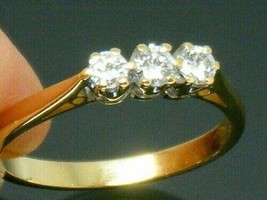 0.33 Ct Round Cut Moissanite Diamond Three-Stone women&#39;s Ring 10k Yellow Gold - $468.26