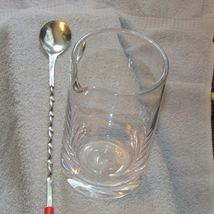 clear glass liquer pitcher 6" tall 3.5" diameter w/12" long metal spoon ... - $9.00