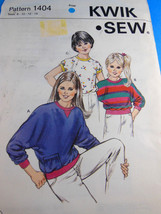 Kwik Sew pattern 1404 Kids pull over tops T shirts for knit fabrics 8 10... - $3.46