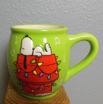 Snoopy Mug Peanuts Worldwide Doghouse with Lights and Music Notes Green 3.5" - $14.85