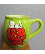 Snoopy Mug Peanuts Worldwide Doghouse with Lights and Music Notes Green 3.5" - $14.85