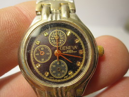 vintage Geneva Ladies Watch - Chronograph, black dial w/ gold , silver band  - £27.49 GBP
