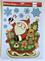 Christmas Santa Sleigh Snowflakes Window Clings Sticks to Windows and More 8 PC - £10.75 GBP