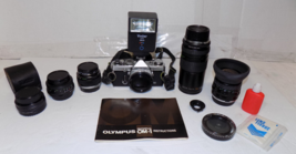 Vintage Olympus OM-1 MD 35mm Film Camera Bundle with Base 4 Lens Manual and More - $391.98