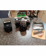 Canon AE-1 35mm SLR Film Camera with Canon 50mm f/1.4 Lens Flash Manual ... - $338.49 CAD