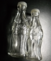 Coca Cola Salt and Pepper Shakers Clear Glass Body Plastic Cap Made in T... - £7.85 GBP