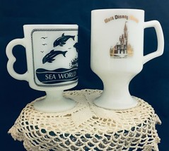 2 vintage milk glass footed cups Walt Disney world in gold &amp; Sea world S... - $14.84