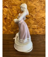 Porcelain Musical Revolving Figurine - Girl with Dog &amp; Puppies in Basket - $17.62 CAD