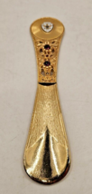 SHOE HORN Souvenir St. Thomas Virgin Island gold color faux jewels saint - $18.37