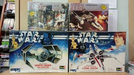 4 Star Wars kits: MPC sealed Y-Wing / AT-ST; Revell-Takara Tie / X-Wing fighters - $228.00